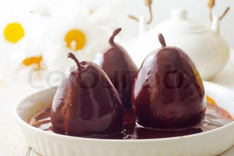Birne mit Schokolade, süße Speisen | Stock Bild | Colourbox