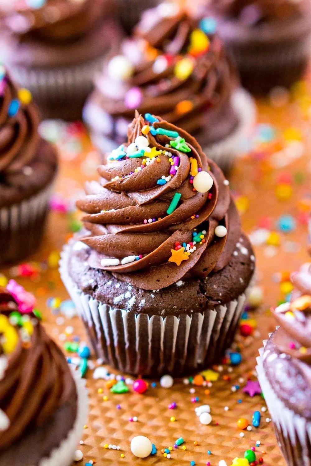 These Chocolate Cupcakes are super moist and topped with a rich and ...