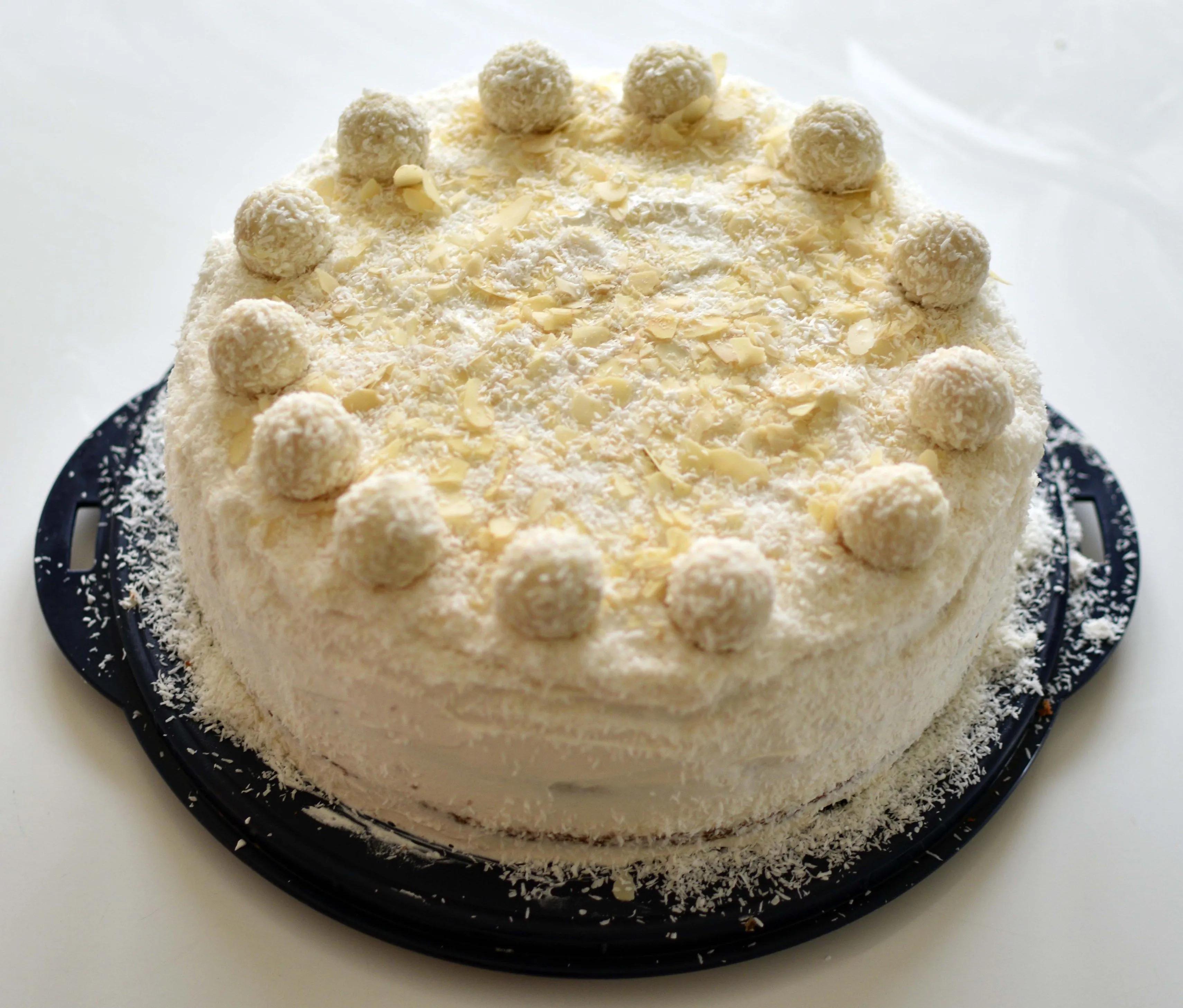 Raffaello Cake | Coconut desserts, Raffaello cake recipe, Cake recipes