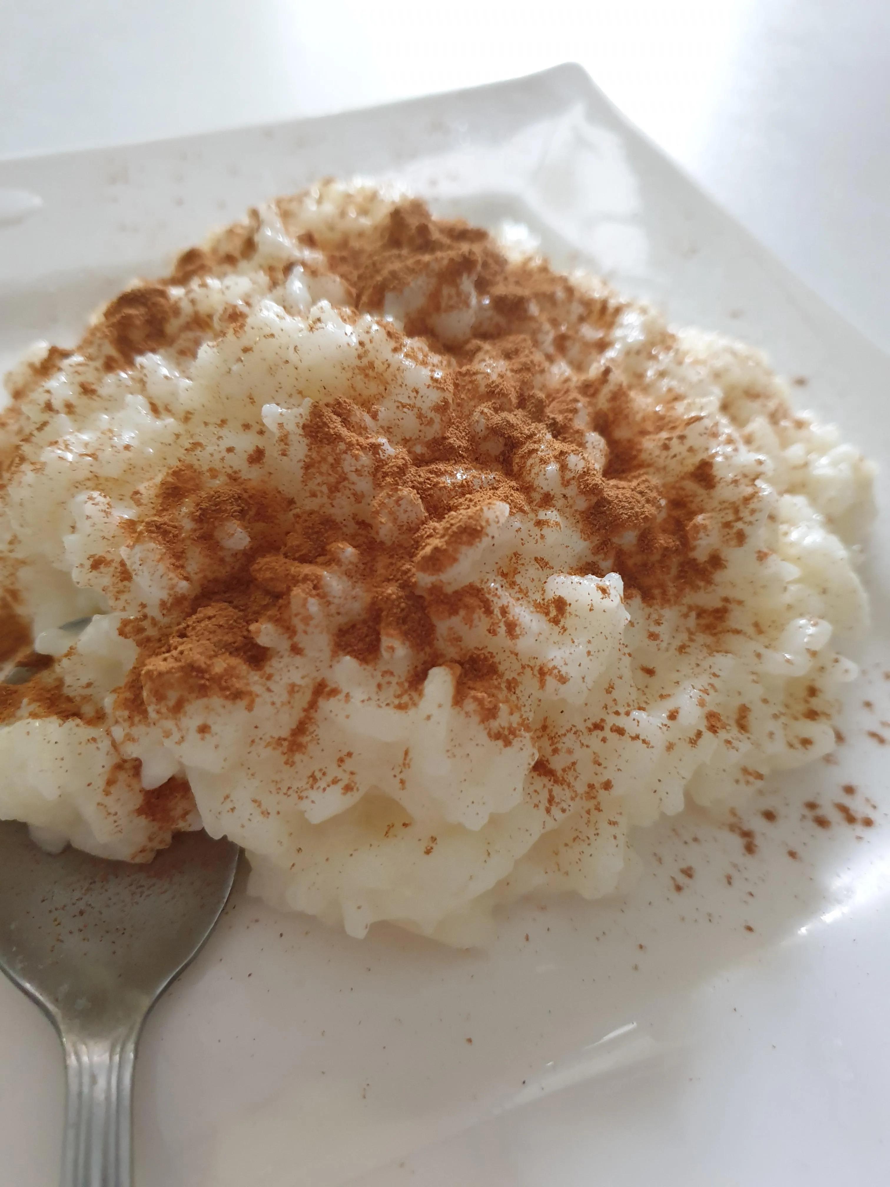 Milchreis (rice cooked in milk) with Cinnamon. A dessert in Germany ...