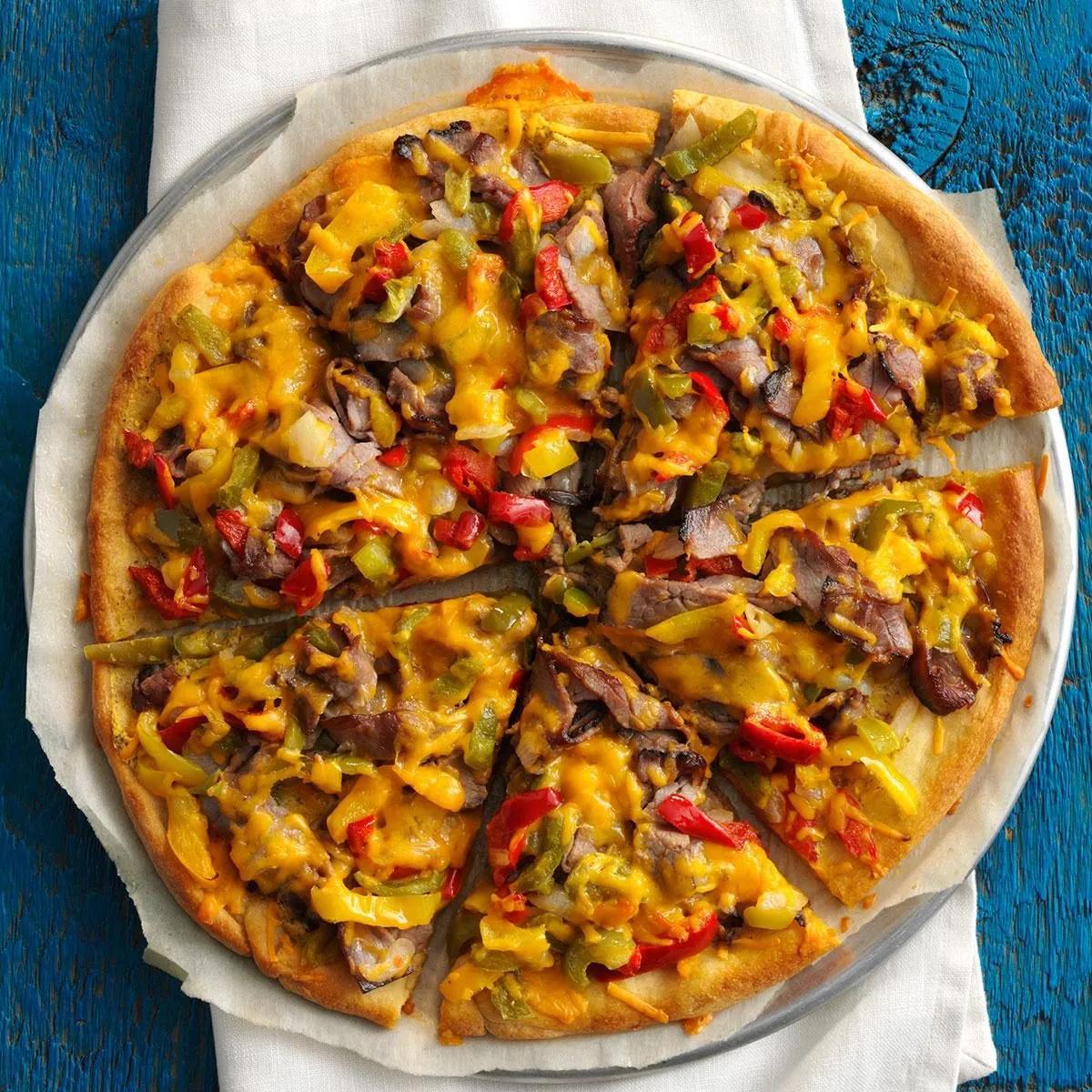 Fast Philly Cheesesteak Pizza Recipe: How to Make It | Taste of Home
