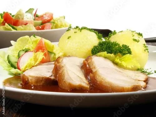 &amp;quot;Schweinebraten mit Kartoffelknödel und Salat&amp;quot; Stock photo and royalty ...