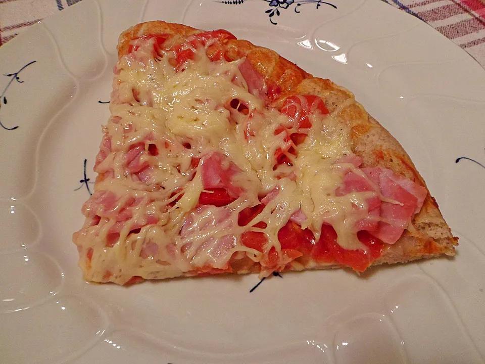 Pizza mit Tomaten, Schinken und Käse (Rezept mit Bild) | Chefkoch.de