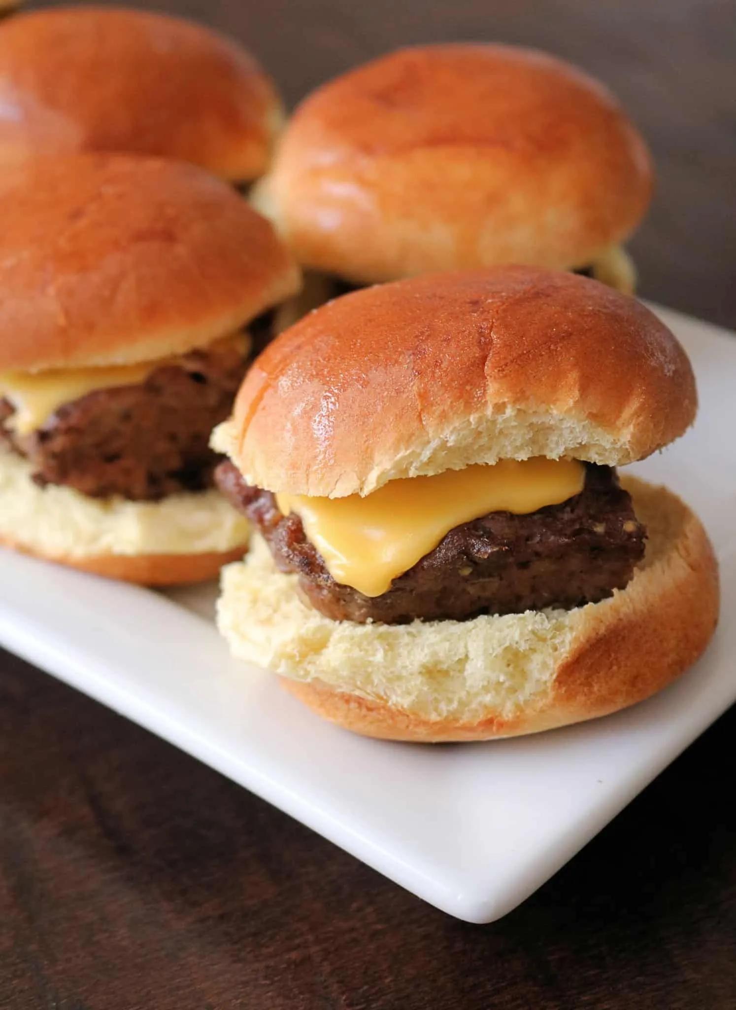Grab some hamburger meat, dinner rolls, and cheese, and make these ...