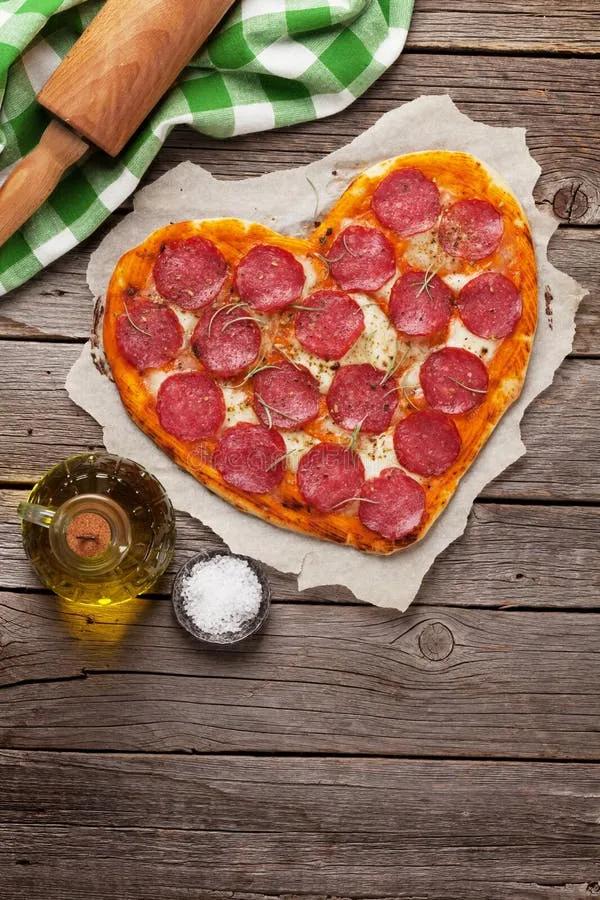 Heart shaped pizza stock image. Image of italian, olive - 107825107