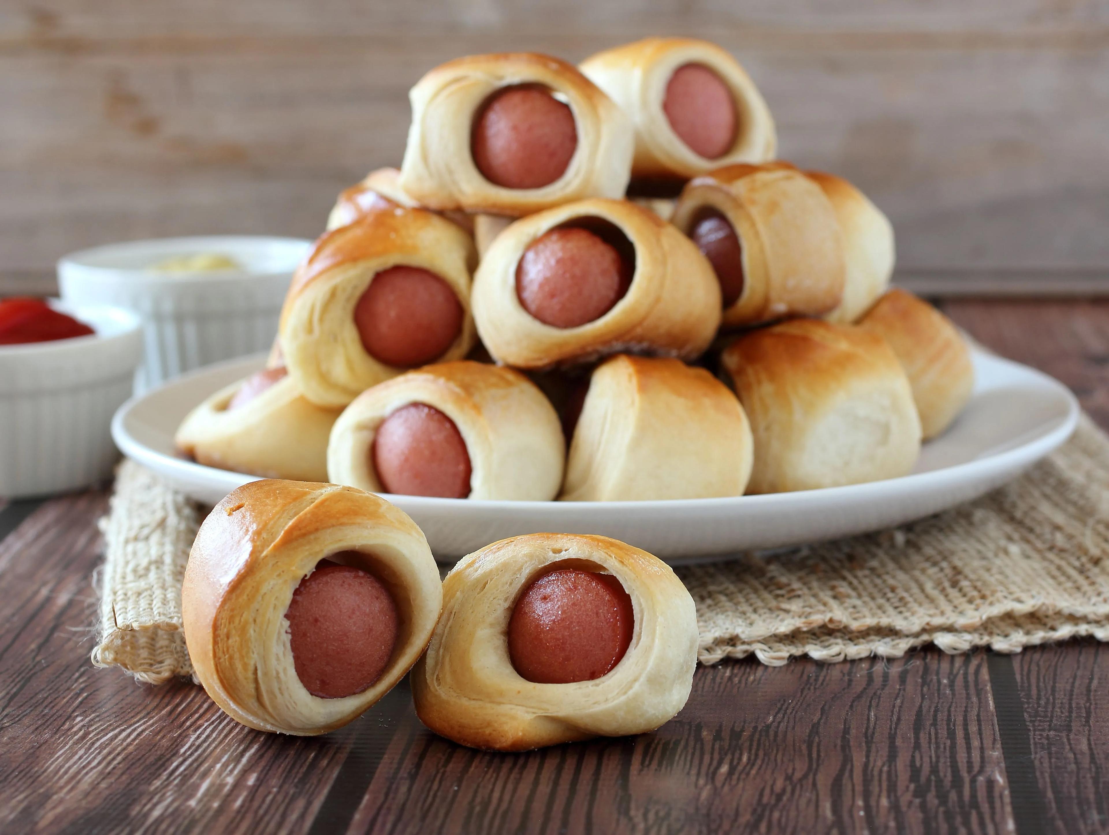 Tasty chunks of hot dogs wrapped in flaky Pillsbury biscuit dough. Only ...