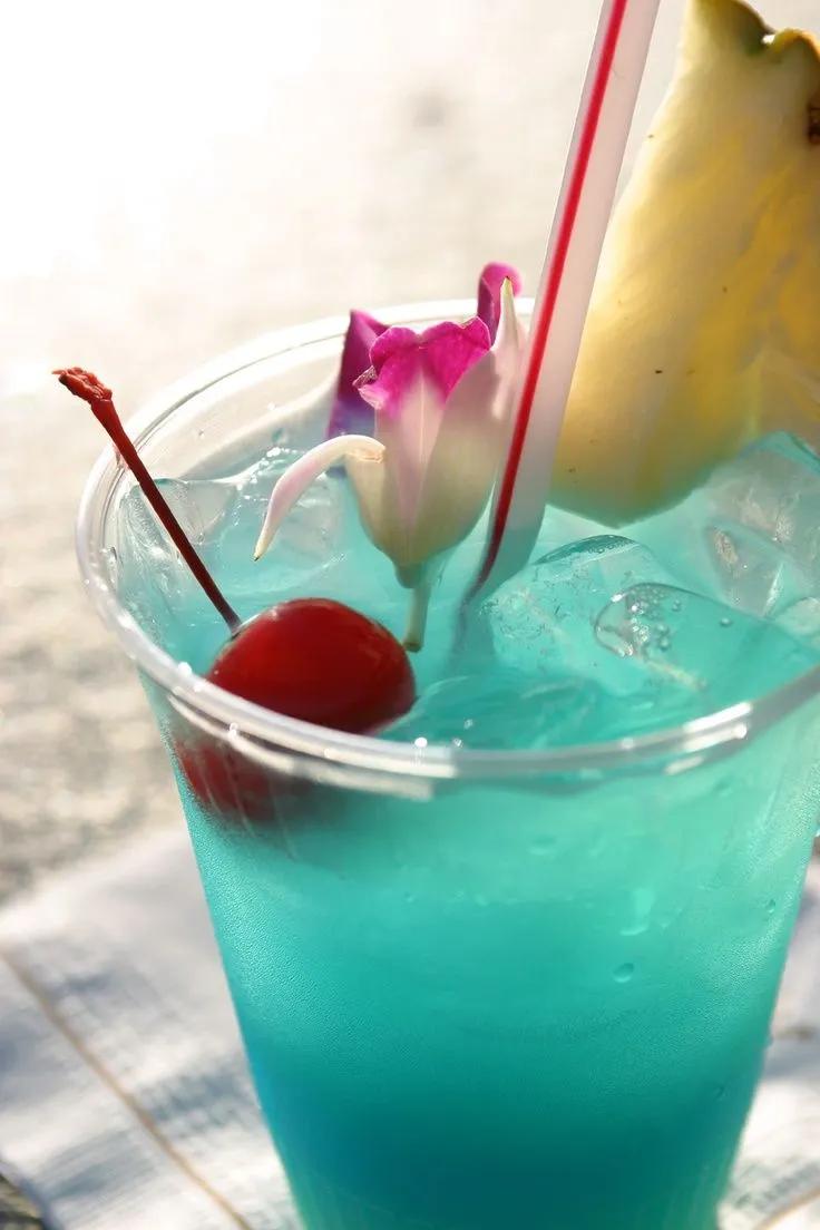 blue hawaiian- malibu coconut rum, blue curacao, pineapple juice ...