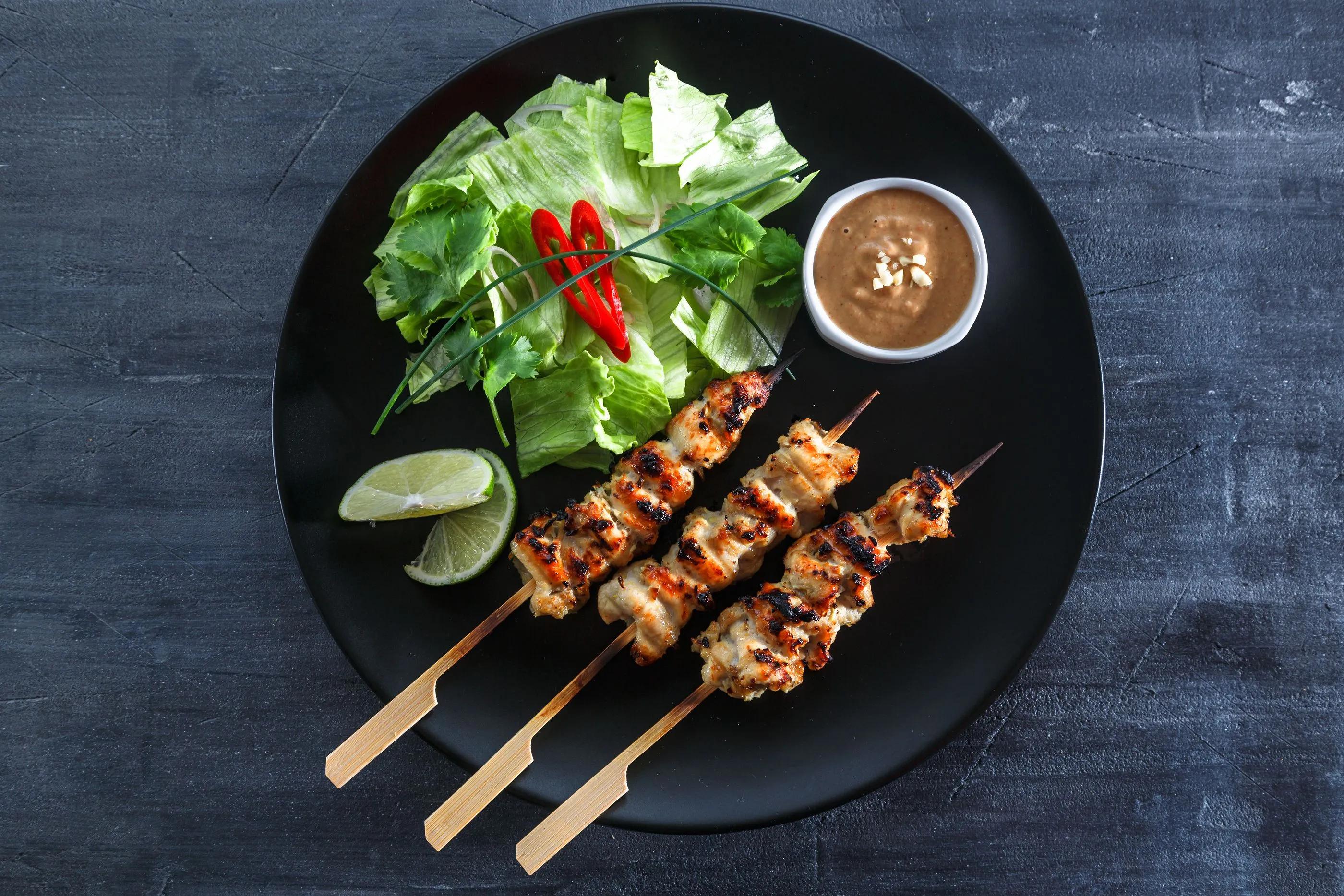 Chicken Satay, the marinated chicken with spicy peanut dipping sauce ...