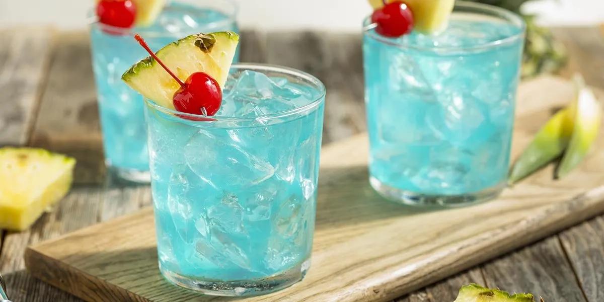 Gin and Blue Curaçao come together in this gorgeous blue cocktail ...
