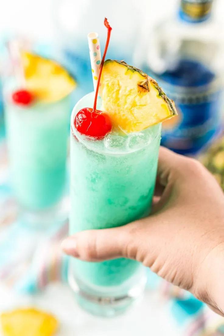Blue Hawaiian Cocktail is a tropical drink recipe made with rum, blue ...