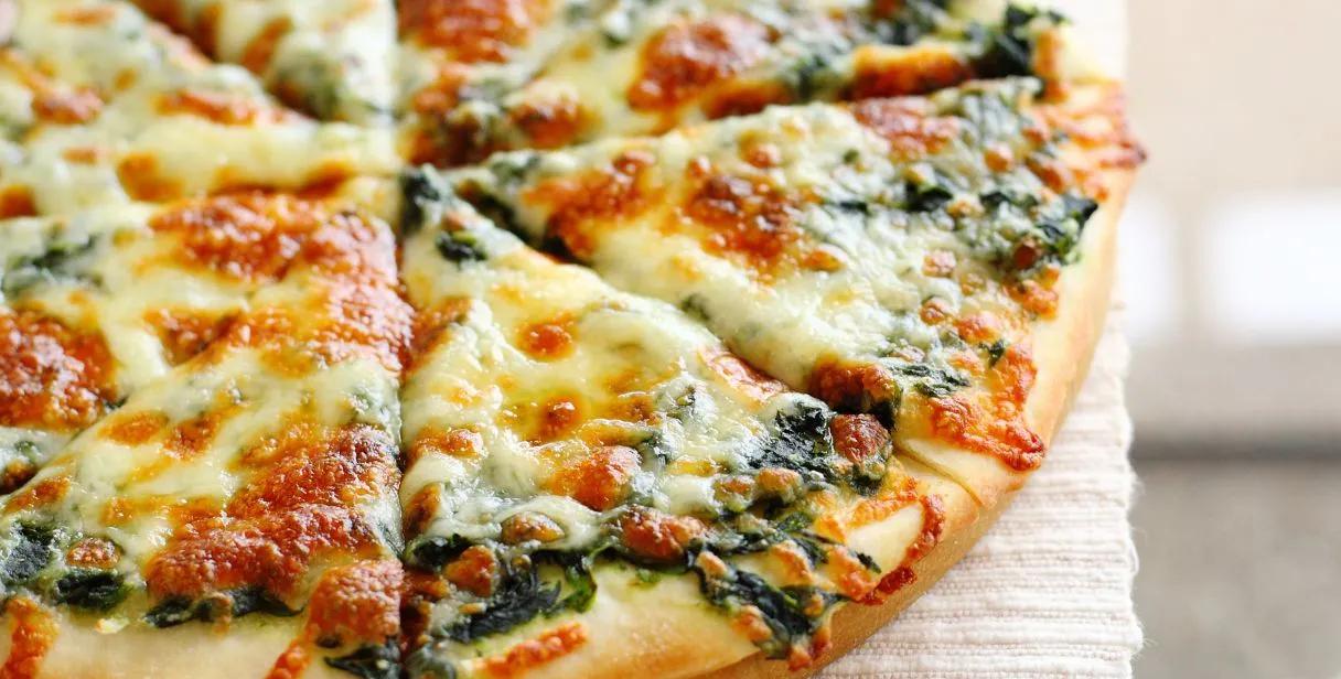 Ricetta Pizza agli spinaci - La ricetta di Piccole Ricette