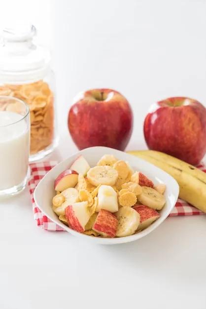 Free Photo | Milk, apple, banana and cornflakes