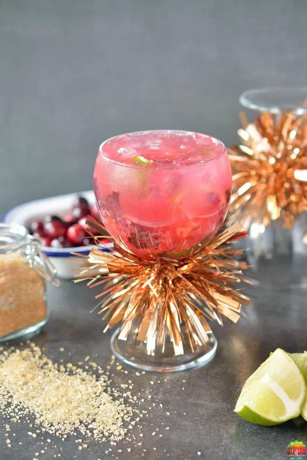 Festive Cranberry Caipirinha is made out of fresh cranberries and is ...