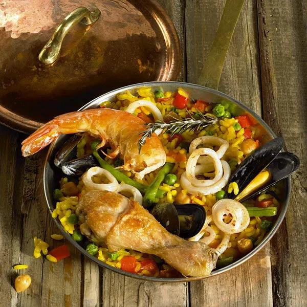 Paella mit Hähnchen und Meeresfrüchten Rezept | Küchengötter