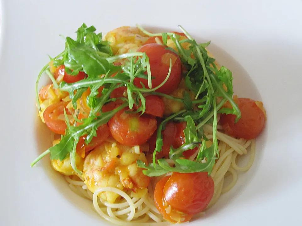 Spaghetti mit geschmolzenen Safran-Tomaten, Garnelen und Rucola von ...