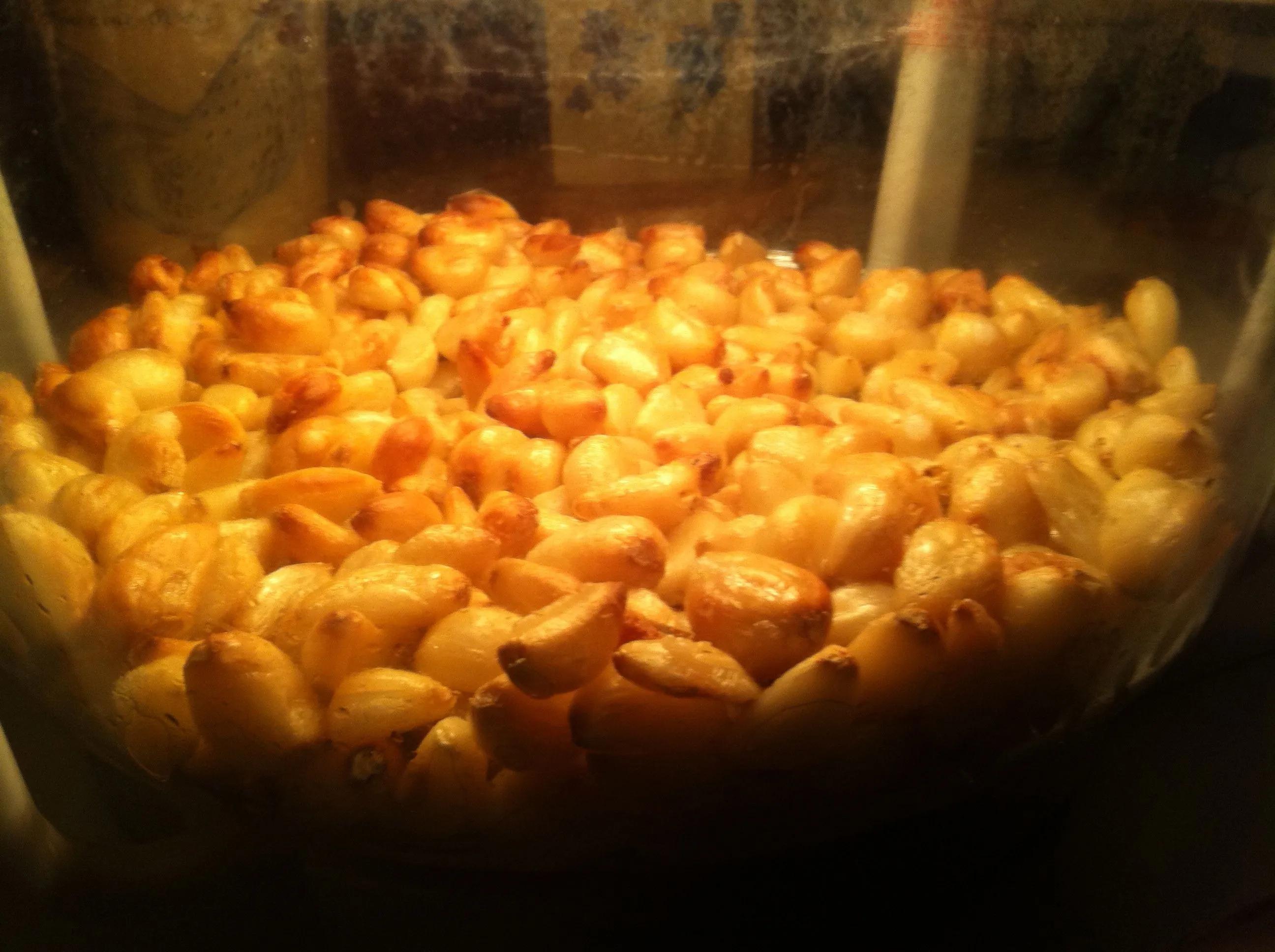 Roasting garlic cloves in the FlavorWave Oven. When done, soak in Olive ...