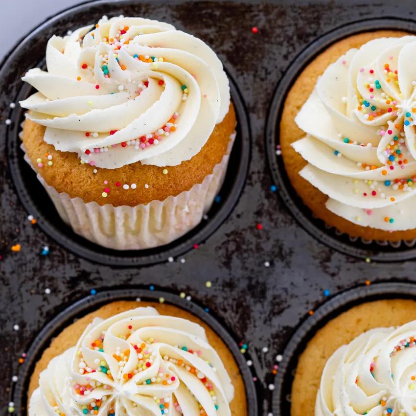 Classic vanilla cupcakes with whipped buttercream - Simply Delicious
