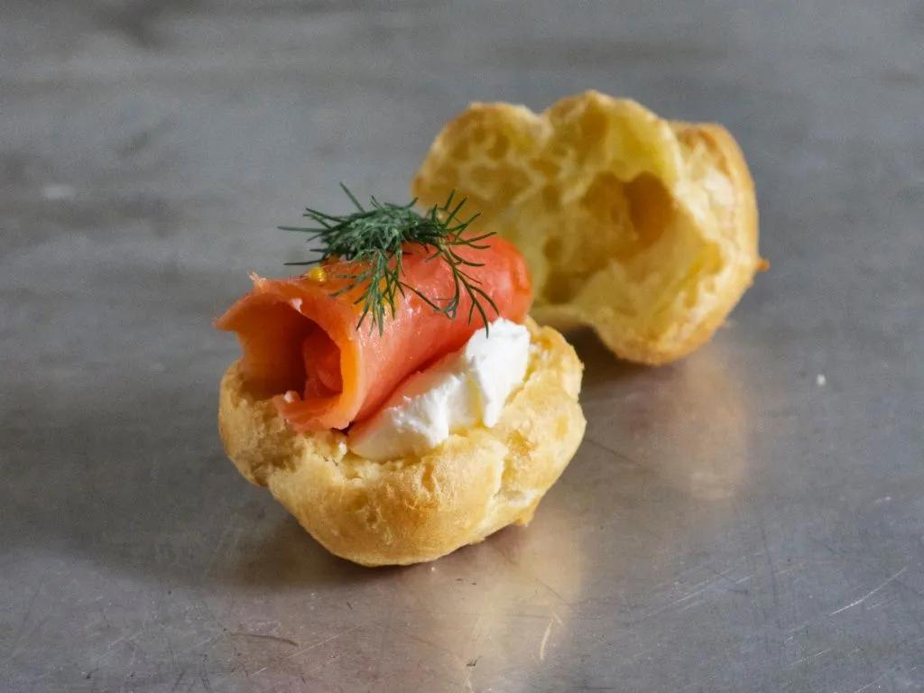 small appetizers with cream cheese and salmon on them
