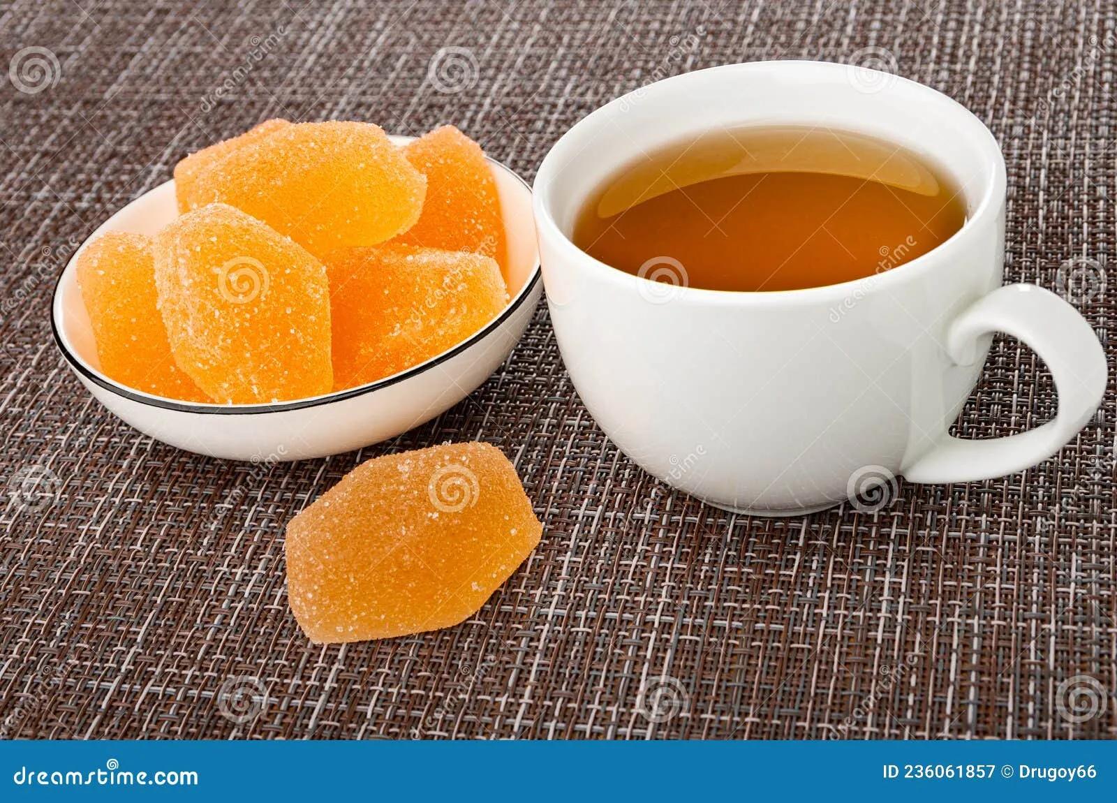 Orange Color Marmalades in White Bowl, Marmalade, Cup with Tea on Mat ...
