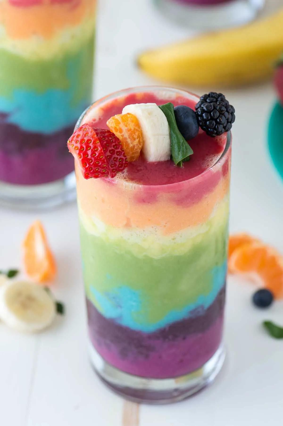 Beautiful 7 layer rainbow smoothie recipe! Full of tons of fruit and ...