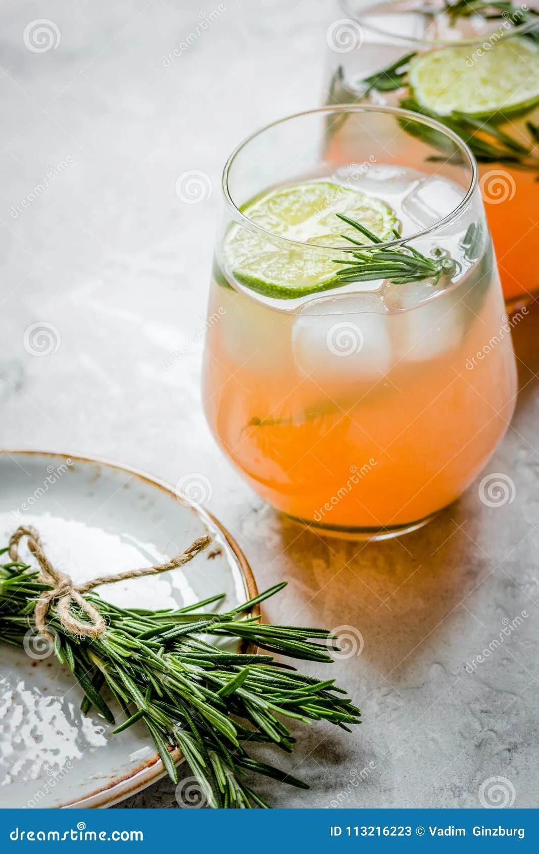 Fitness Cocktail in Glass with Lime and Rosemary on Stone Table Stock ...