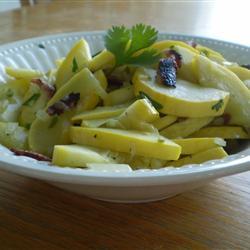 gelbe zucchini mit speck